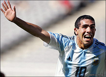 Argentina's Carlos Tevez scores the winning goal in the 2004 Olympic football final in front of a half-empty stadium