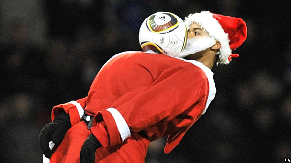 'Father Christmas' juggles ball at West Ham
