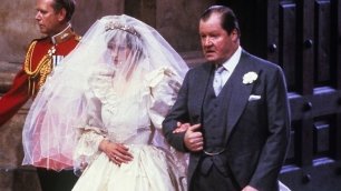 Princess Diana on her wedding day walking up the aisle with her father Earl Spencer