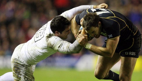 Brad Barritt tackles Sean Lamont