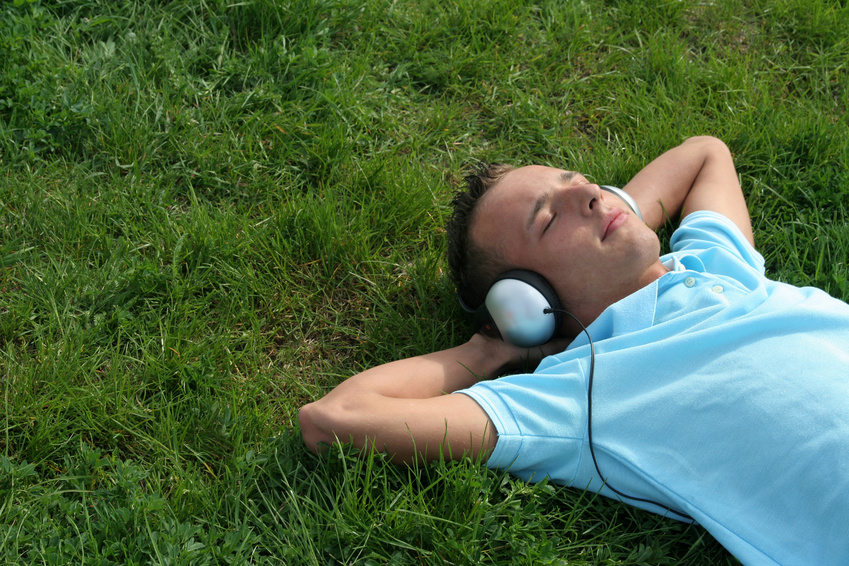 young man listening to music @ Edyta Pawlowska - fotolia.com