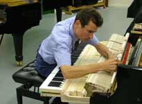 Ulrich Gerhartz tuning a piano