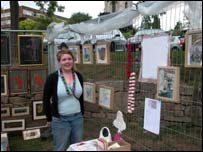Debbie Thomas with her colourful artwork