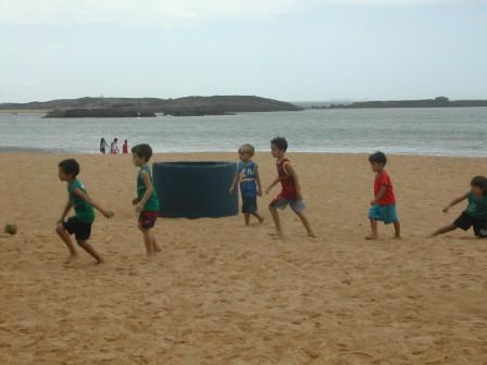 He and friends at Praia da Costa beach