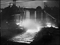 Casting pig iron from number 2 furnace at night