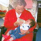 Good grub! - Minnie with her great grandchild