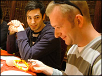 Tim using chopsticks