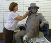 Barbara Asquith working on the sculpture of Blind Jack