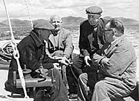 (from left to right) Bill Quinn - builder, Tommy Ferguson - fishing officer, John Campbell - boat owner and Albert Annett - engineer