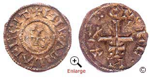 A silver penny from the reign of Cnut, Viking King of York around 900-905. Minted at York. Obverse (left) reverse (right)