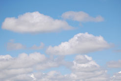 white clouds against light blue sky