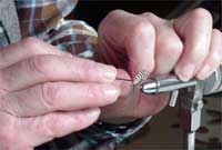 Emrys Evans yn cawio