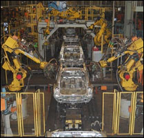 Cars being built on the production line