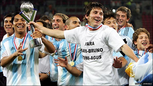 Lionel Messi (white T-shirt) and his Argentina team-mates celebrate winning the 2005 South American under-20 Championships. 