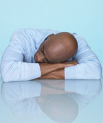 Man at desk (Getty Images)