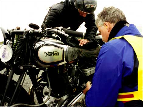 Man fixing motorcycle