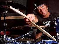 Chad Smith shows off his tricks with sticks.