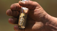 A vial of gold flakes 