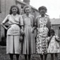 (L to R) Anne's aunt Margaret, Bernadette McAlweaney, aunt Annie and Anne. This was taken in McNameys where Anne's grandparents lived. 1950