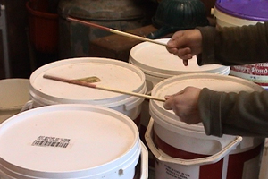 Lydia has taken inspiration from food containers in her takeaway to form a Chinese drum orchestra.