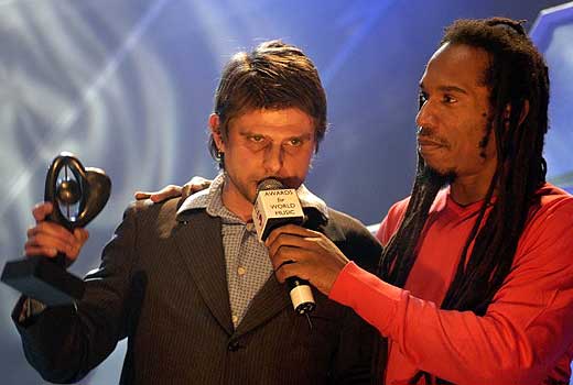 David Bovee from Think of One accepts their award