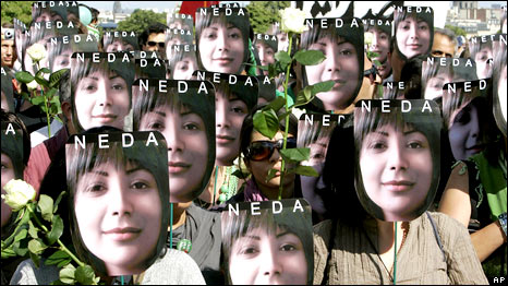 People hold placards bearing images of Iranian Neda Agha-Soltan in Paris, July 25, 2009