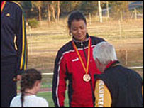 Lauren Therin recieving her medal
