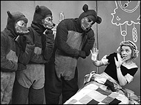 Goldilocks is caught in Baby Bear's bed