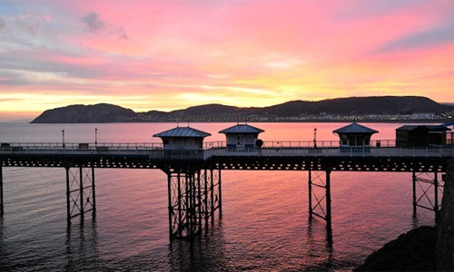 Sunset over Llandudno pier by Mike Pritchard.