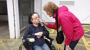 Liz Carr's mother attends to her every need