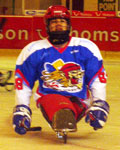 Nathan in his sledge hockey protective gear