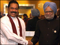 Dr. Singh (r) with President Rajapaksa (file photo)