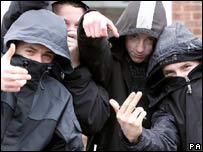 Teenagers wearing hoods