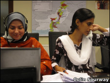 Asma of the Pashto team (left) and Rizwana of the Urdu team manning the phones