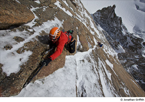 Climber Ueli Steck about to finish a line on the south face of the Pointe Lachenal in winter