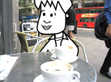 Tim sitting outside a cafe