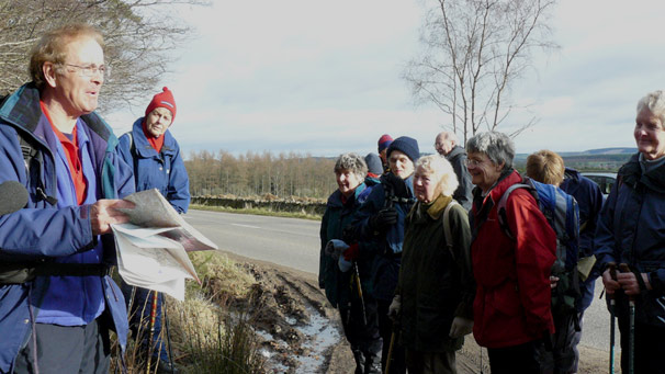 Hillwalkers listening to walk leader