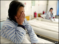 Mulher com Aids em hospital na China
