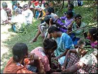 Relatives of the dead and villagers gathered to the scene (photo Raj Weerasinghe)
