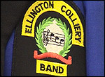 The logo on a band blazer