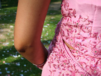 Close up of pink embroidered asian gown