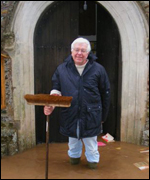 Churchwarden David outside the church
