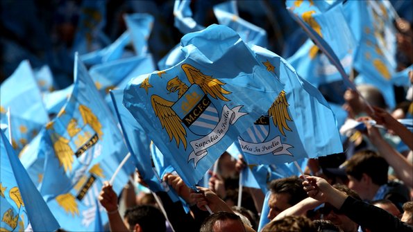 Man City fans waving flags