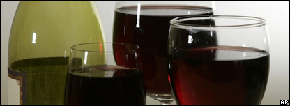 A wine bottle and some glasses