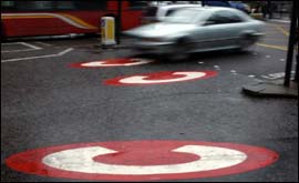 London traffic conjestion sign with car 