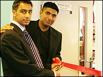 Wajid Khan and Zahoor Hussain cut the ribbon to officially open the Centre for Volunteering and Community Action.