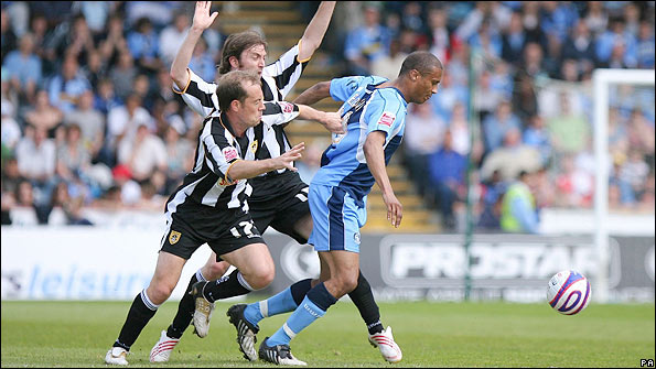 Strachan in action during his last match against Wycombe