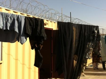 Women's clothes hanging from a clothes line in a prison in Helmand province, Afghanistan