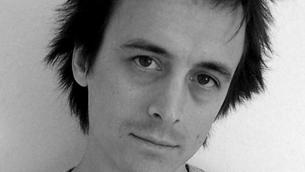 Black and white image of Tom Bullough