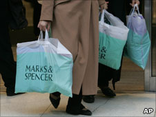 Woman carrying M&S bags